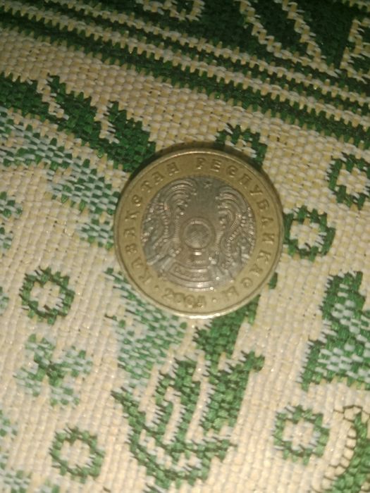 100тг из 2004года