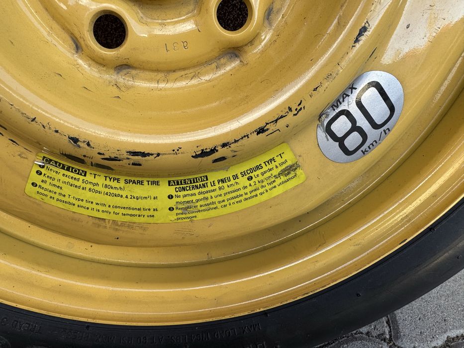 * Nouă* Roată de rezervă T135/70D16