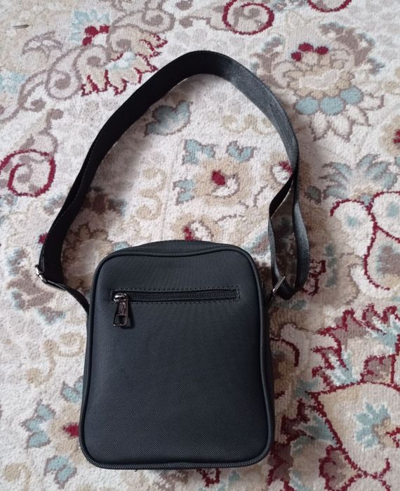 Продаю барсетка лакосте новый