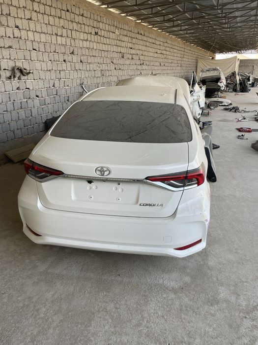 toyota corolla 210 бампер крыло