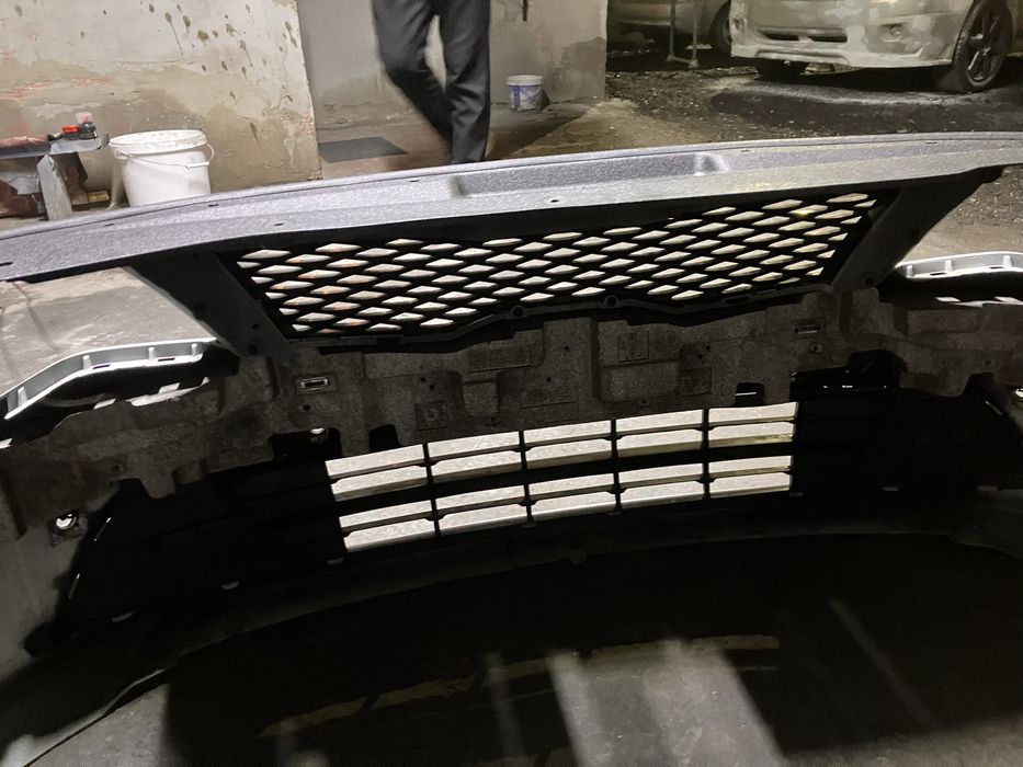 Передний бампер Оригинал