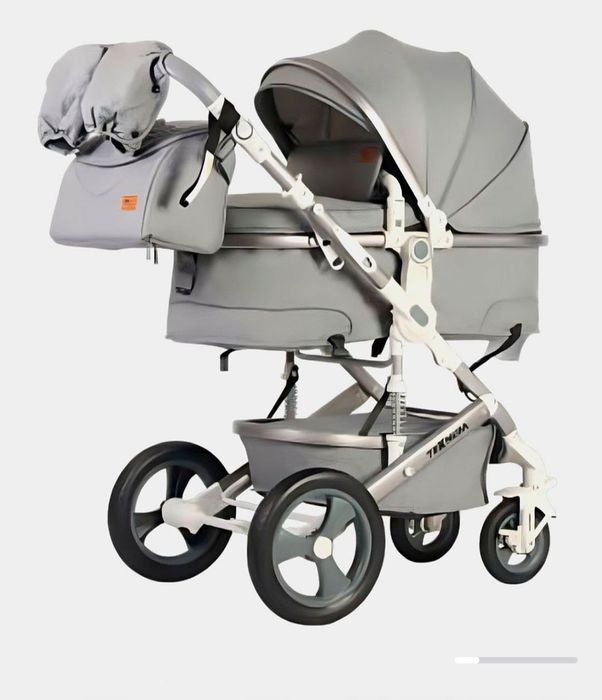 Коляска трансформер 2таси 1да . Почти янги ку'п ишлатилмаган