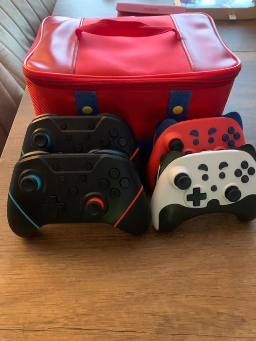 Nintendo Switch Oled +четири джойстика и чанта