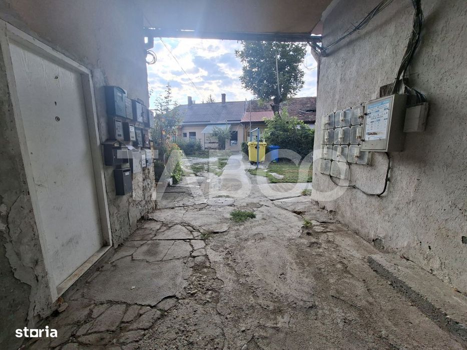 Garsoniera de vanzare aproape de centru cu bucatarie separata