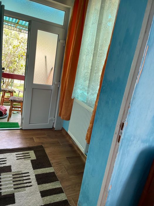 Casă cu 2 camere , teren generos de 1.057 m²