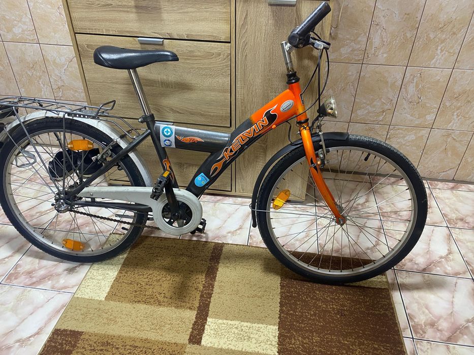 Vând bicicletă roți de 24