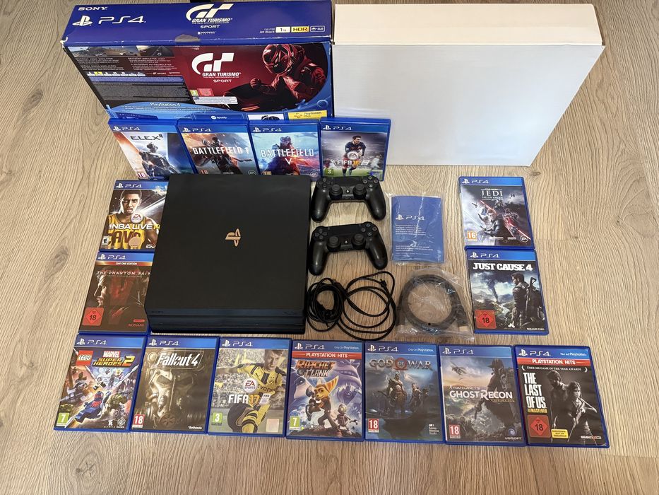 Playstation 4 PRO 1 TB с 2 контролера плюс 15 диска