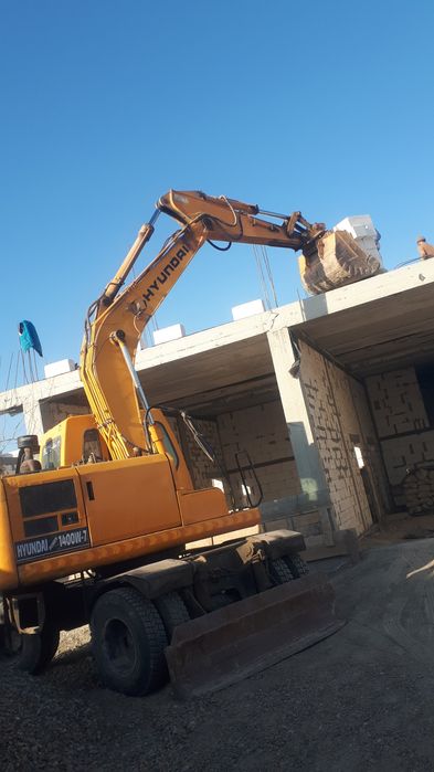 махсус техника экскаватор хизмати бухоро ш