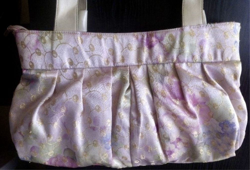 Елек пухенка - 2 броя + подарък чанта