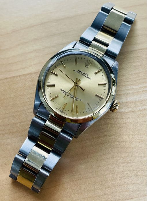 Rolex aur cu otel Oyster Perpetual.