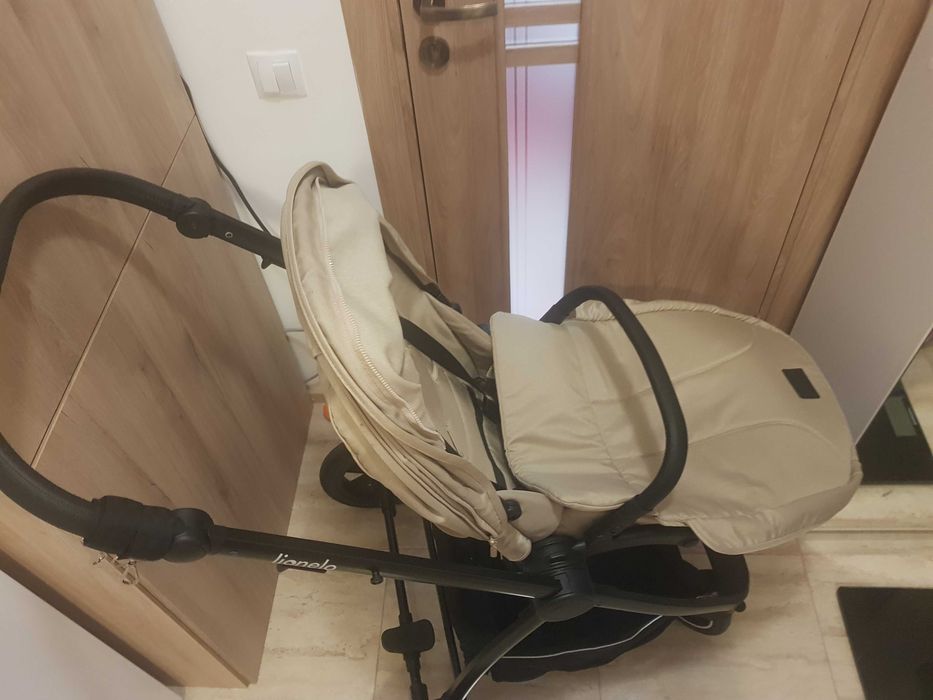 Carucior 3 in 1, Lionelo, Meril, Cu landou de dimensiune XL, Reversibil, Cu scoica auto testata ADAC, Cu accesorii, Pana la 22 kg, Bej