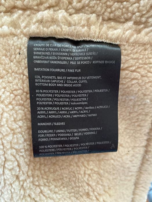 Дамско зимно яке с агнешка кожа и подвижна качулка