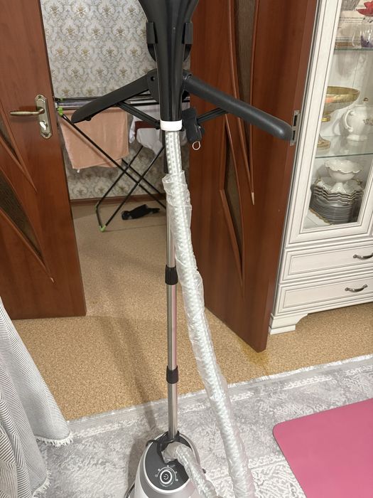 Отпариватель для одежды.