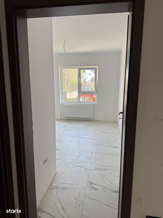 Aparatment 52 mp + Curte Proprie 55mp + Loc de parcare Subteran