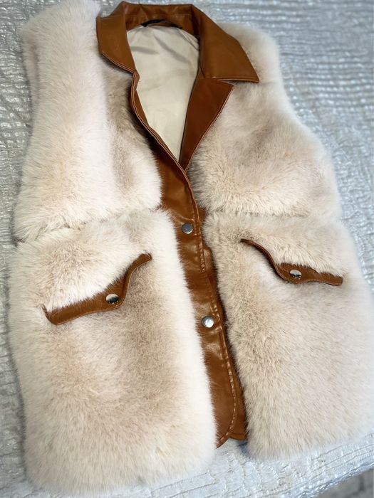 Дамски пухен елек