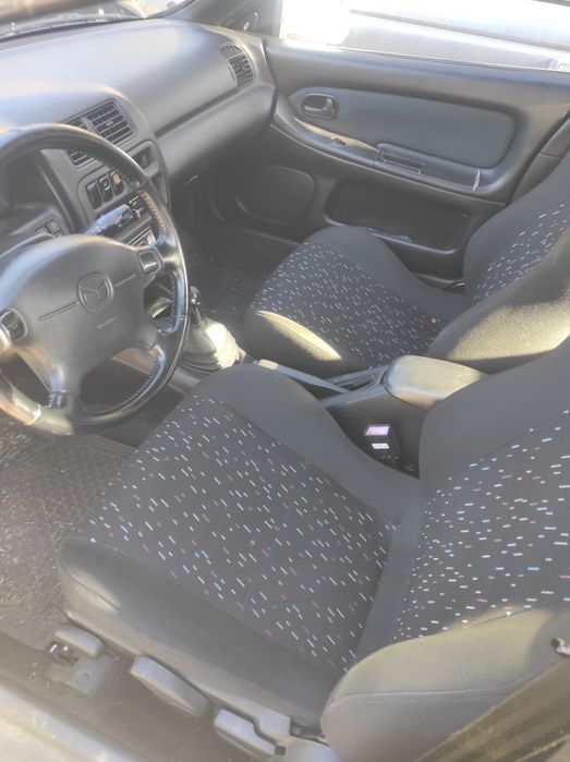 Мазда 323 бензин на части