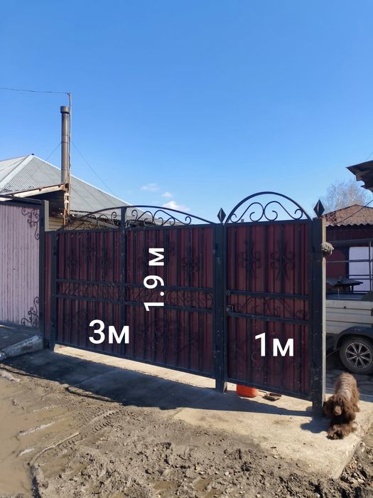 Продам ворота металические с калиткой и столбами