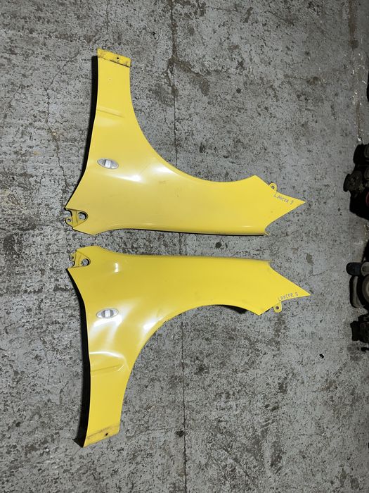 Крылья передние Mitsubishi Lancer 9