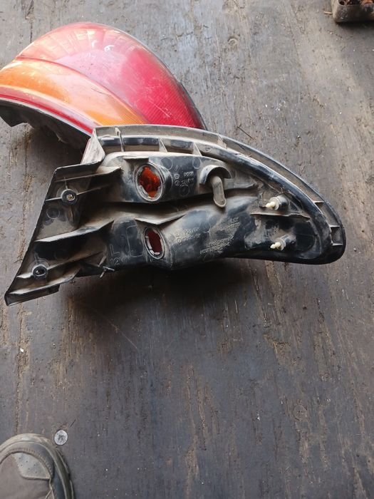 Фонарь Мазда 323F 1995г левый