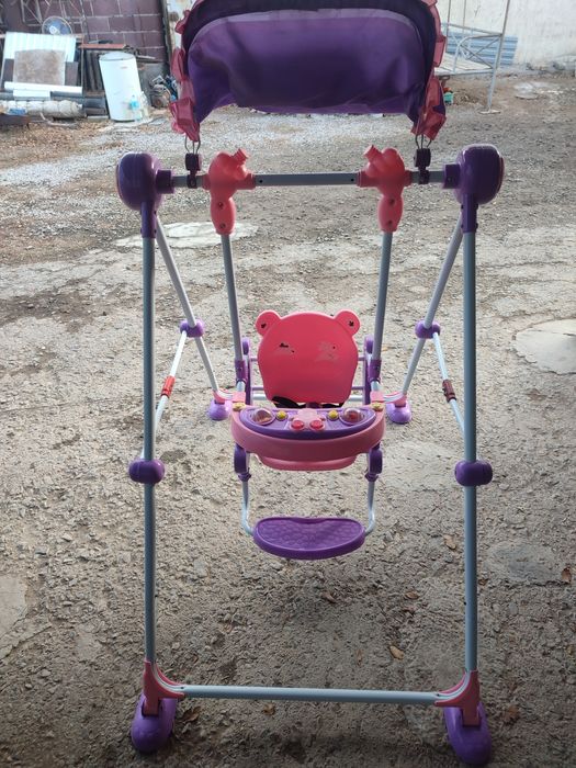 Детская качеля розовая
