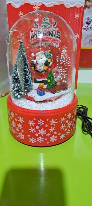 Янги йил учун сувенир музыкальный свети ёнади кор парчалари учади