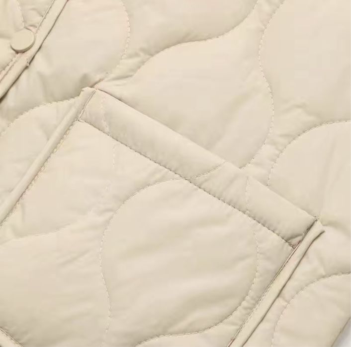 Женская жилетка