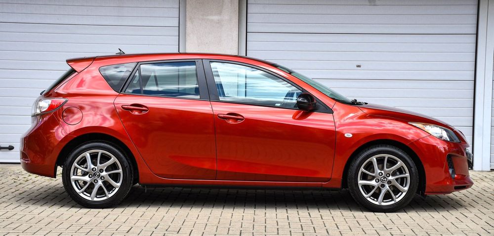 Mazda 3 model Kenko-Edition benzina 2013 105 cai