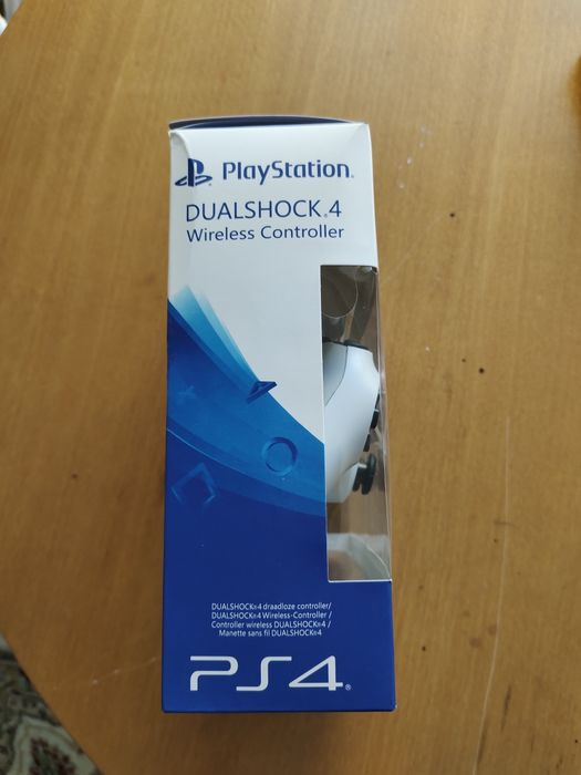 Игровой контроллер Sony Dualshock 4 белый