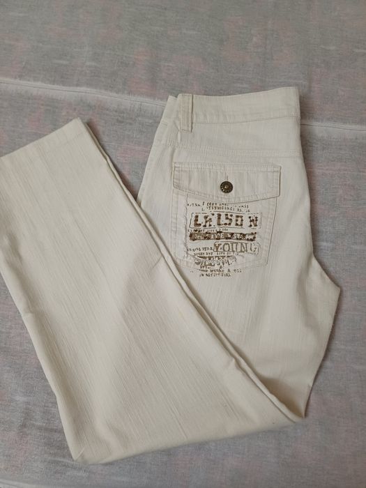 Продается  бежевый брюк