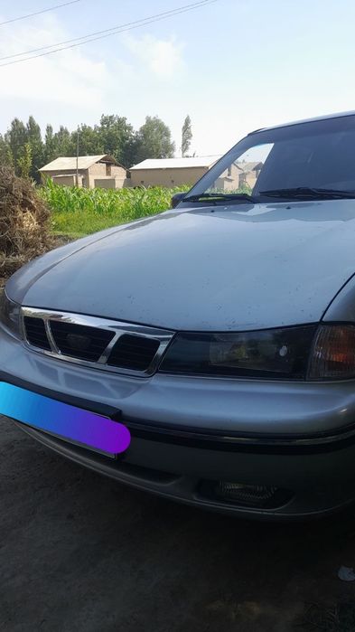 Nexia 1 yili 2004 kul rang