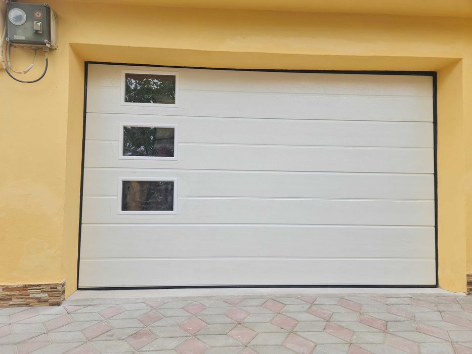 vand si montez usi de garaj automate in motru