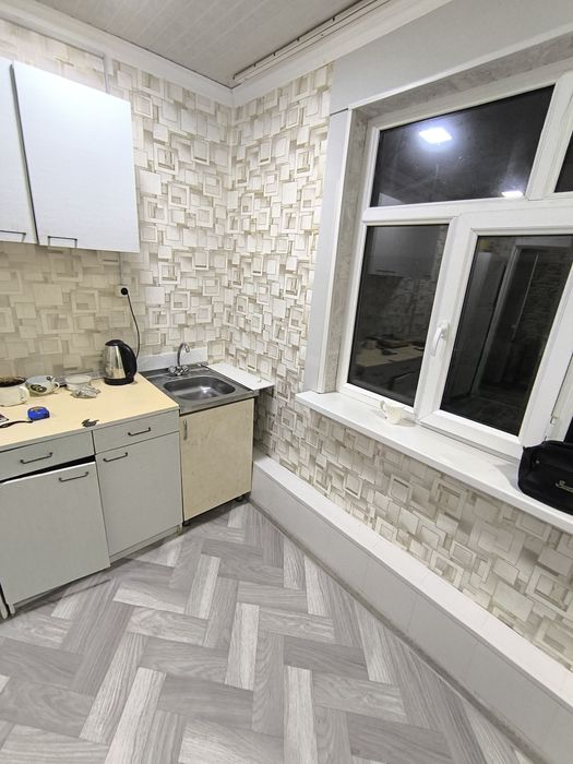 Однакомнатная квартира в деревянном доме. С ремонтом и обстановкой.