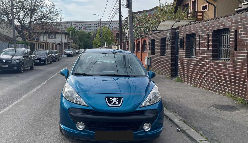 Peugeot 207 cutie automata japoneza si cu padele la volan