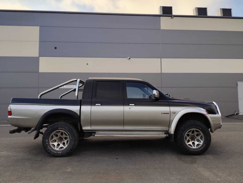 Mitsubishi L200 2.5td 4x4 115cp 5locuri si bena