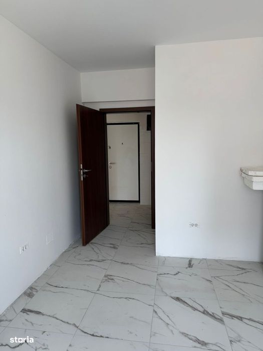 Aparatment 52 mp + Curte Proprie 55mp + Loc de parcare Subteran