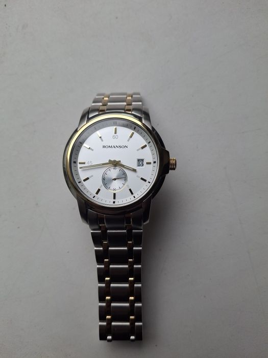 Продам часы Романсон