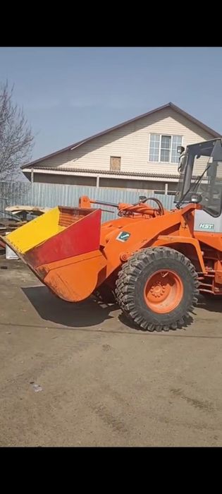 Фронтальный погрузчик продам