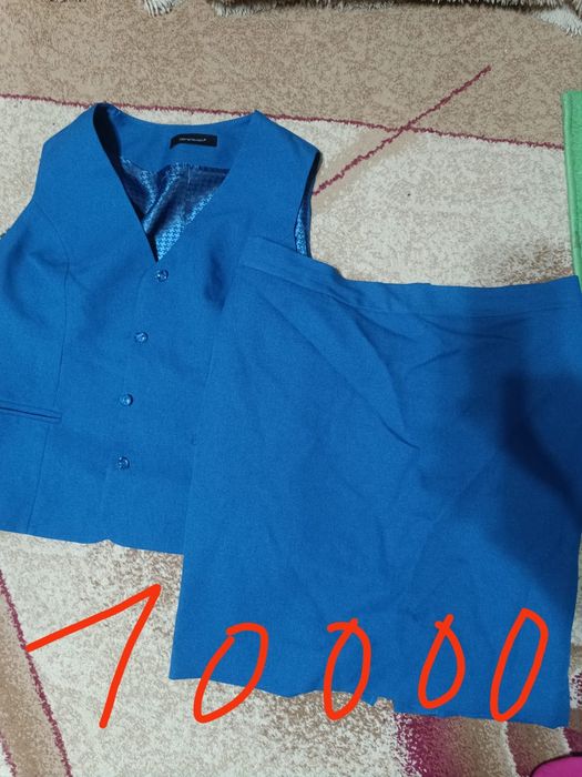 Продам костюм и юбки