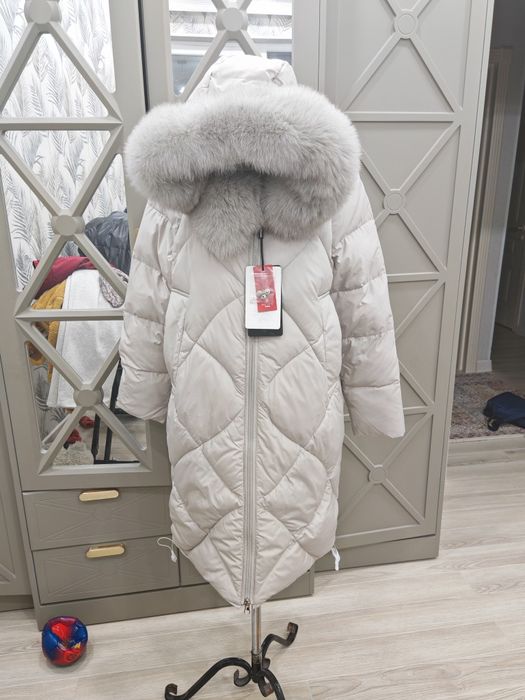 Продам Пуховик новая