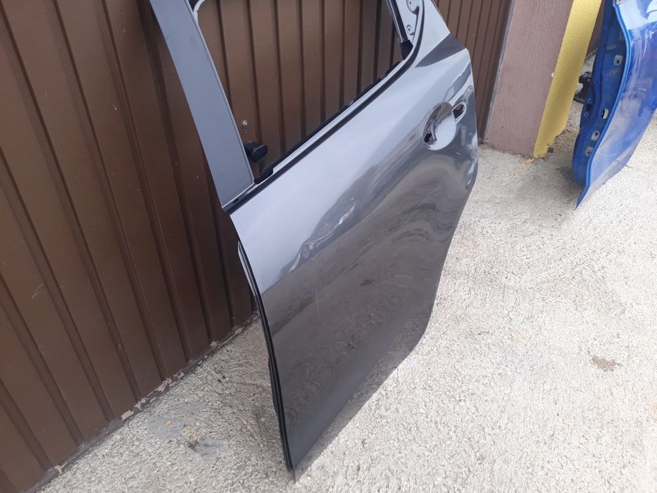 Usa stanga spate mazda 2