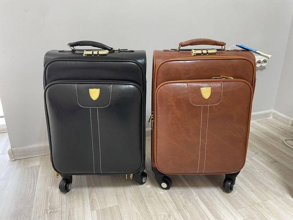 Маленкие новые чемоданы