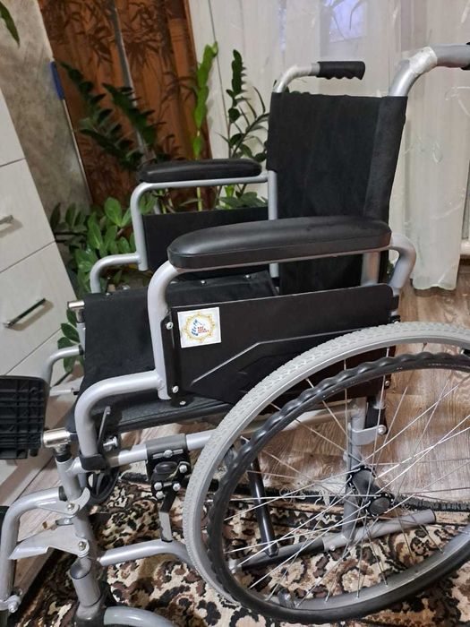Инвалидная коляска