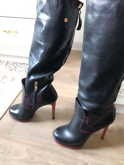 Продаю кожаные сапоги