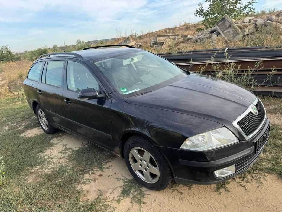 Piese Skoda Octavia 2 non facelift - negru - Bara fata , capota motor , trager , motor 1.9 TDI 105cp cod BKC , aripi usi manuala 5 trepte cutie JCR