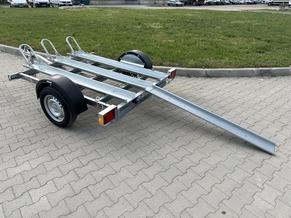 Ремаркета / платформи / колесари за превоз на мотори и АТВ под наем