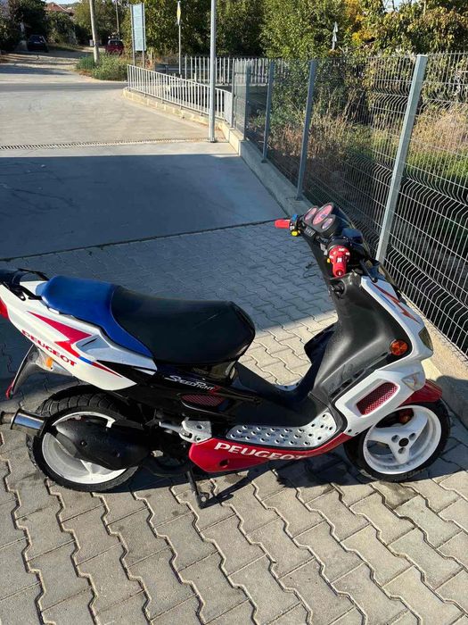Скутер  Peugeot speed fight