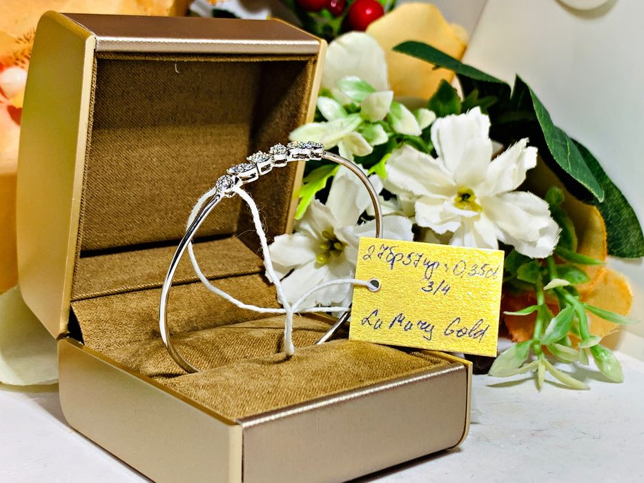 золотой браслет с бриллиантами в белом золоте