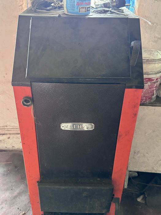 Продам котел длительного горения.