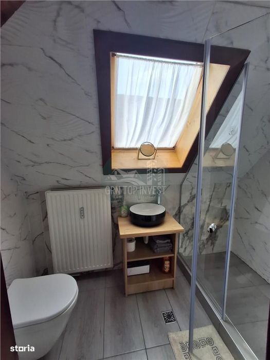 Casa individuala 4 camere 4 bai 250mp curte zona Piata Cluj