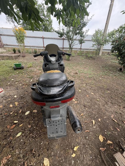 Malaguti madiosn 125cc 4 timpi